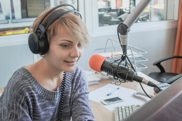 girl DJ in the radio station studio