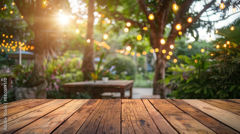 Sticker Blurred background of a wooden table with a party in a garden. Nice views of the natural landscape.