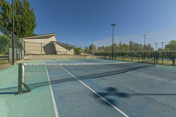  Tennis is played on tennis courts, a racket sport that is played individually or in pairs