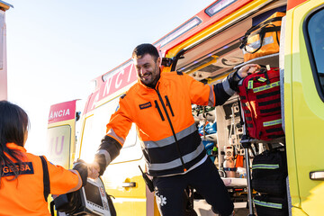 Paramedics working at the ambulance.