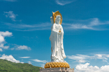 SANYA, HAINAN, CHINA Buddhist deity statue view from the sea