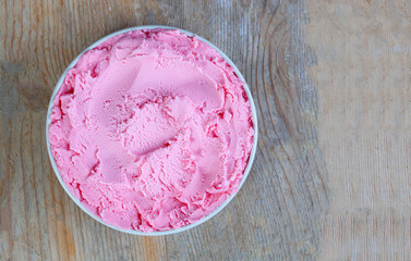 Bowl with strawberry ice cream, strawberry ice cream texture...