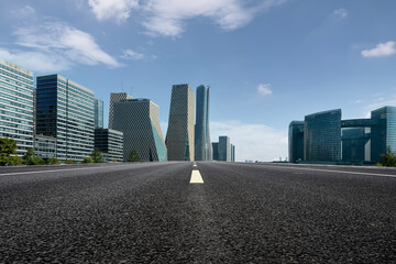 Modern City Skyline with Road Perspective