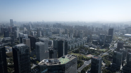 Obraz premium Modern Urban Cityscape with Skyscrapers and Green Spaces