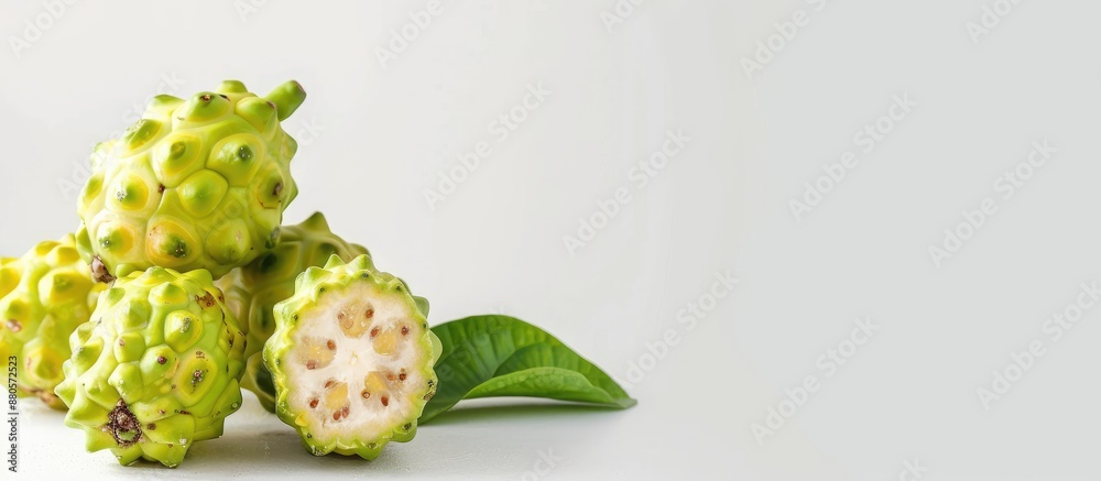 Aufkleber noni fruit displayed against a plain white backdrop with space for copy
