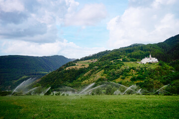 Burgusio, South Tyrol, northern Italy. Marienberg Abbey and its castle dominate the landscape of...