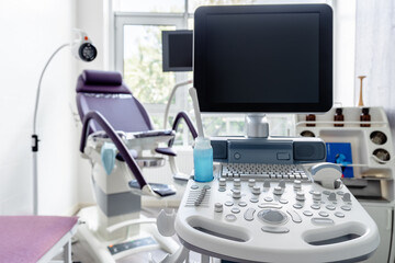 Interior of hospital room with ultrasound machine