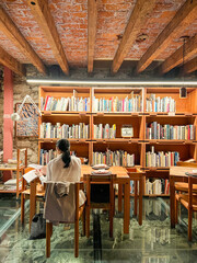 Reading a book at restaurant