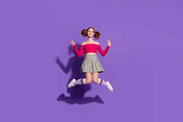 Full length photo of adorable lovely girl wear off shoulders top jumping showing v-signs empty space isolated purple color background