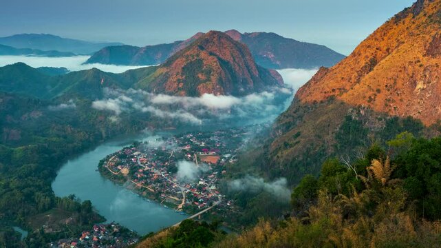 Time lapse of aerial view of Nong Khiaw village at sunrise, Luang Prabang, Laos