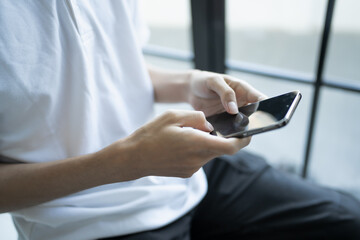 Man hold smartphone modern technology engagement in daily life