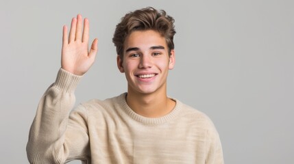 The young man waving