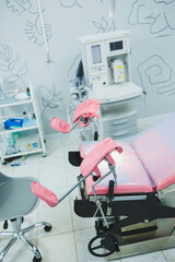 Modern medical equipment in the gynecological office. Gynecological chair in the office for examining women.
