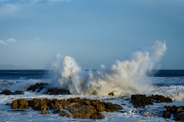 Wild, winter storm conditions at Kwaaiwater with ocean waves breaking onto the rocky Hermanus coastline. Whale Coast, Overberg, Western Cape, South Africa.