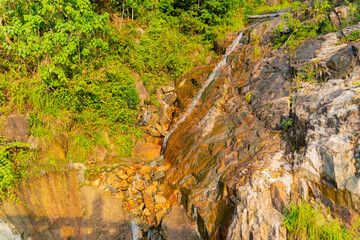 A small waterfall.

High-altitude areas near Dalat in Vietnam. 