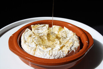 Baked cooleeny brie with honey drizzle