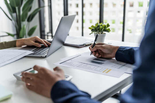 Business Professional Chartered Accountant Woman working with computer and calculator Sales Invoice Accounting