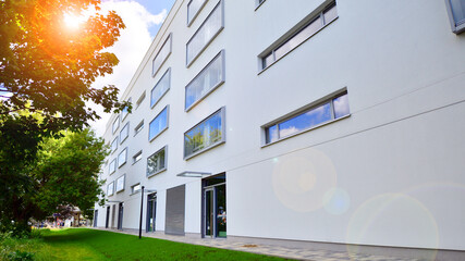 Eco apartment building saving energy and fresh air concept. European residential architecture...