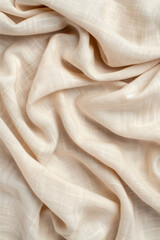 Close-up of light beige fabric with soft folds and textures, creating a gentle, flowing pattern ideal for backgrounds or textile design concepts.