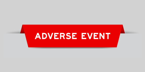 Red color inserted label with word adverse event on gray background