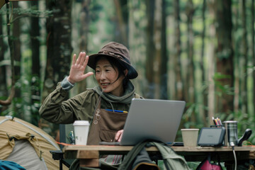 Caucasian woman with laptop in nature