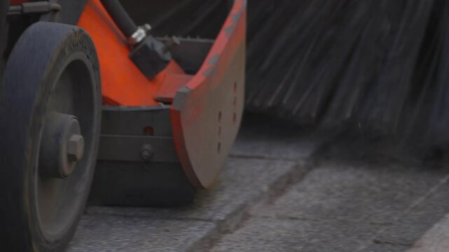 vacuum sweeper working on the road