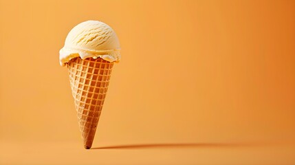 Orange Ice Cream Cone on an orange Background with Copy Space