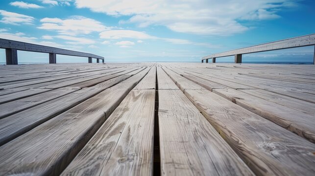 Fototapeta Seaside boardwalk with wooden plank and decking low angle view of patio deck pier