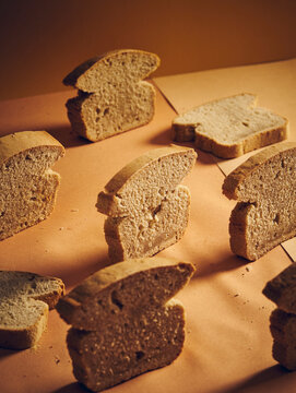 slices of white bread on an orange background