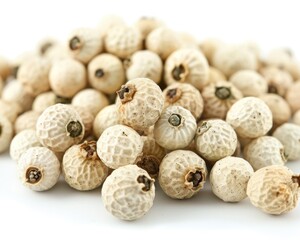 White Pepper. Isolated White Peppercorn on Wooden Surface. Aromatic Spice and Ingredient Concept.