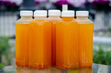 cans of fruit juice for sale on the table.