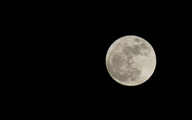 Full moon in black sky at night