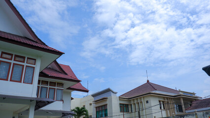Office Buildings In The Morning With A View Of A Clear, Cloudy Sky