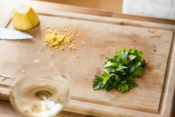 chopped parsley on a wooden board