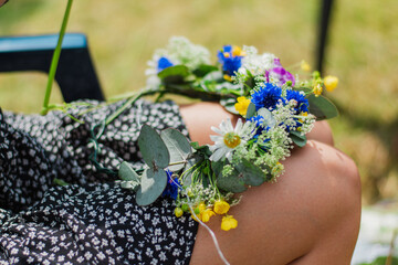 making a flower crown for midsummer