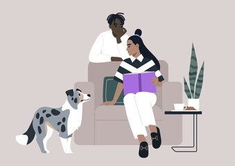 A Quiet Afternoon With a Furry Companion, Two partners sit together on a couch, one reading a book and the other listening intently, while their dog stands by, watching with interest
