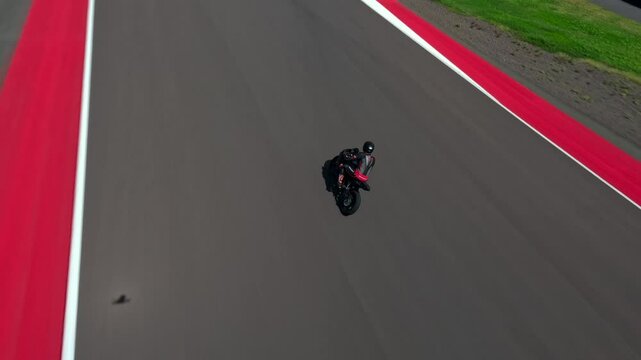 A motorcyclist rides on a race track. Motorcycle racer training.