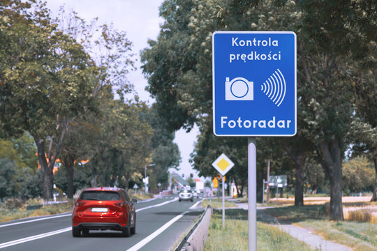 Polish road sign reading "speed control - a speed camera ahead".