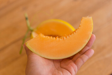 a lot of piece of fresh orange melon on the plate