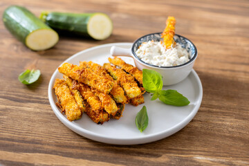 Crispy baked zucchini fries with dipping sauce Healthy food