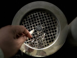 Cigarette ashtray made of shiny stenlis