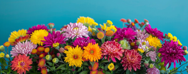 A flower display podium featuring a mix of vibrant asters, their cheerful blooms adding a touch of whimsy and fun.