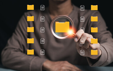 Document management. uses magnifying glass to manage enterprise file content digital asset...