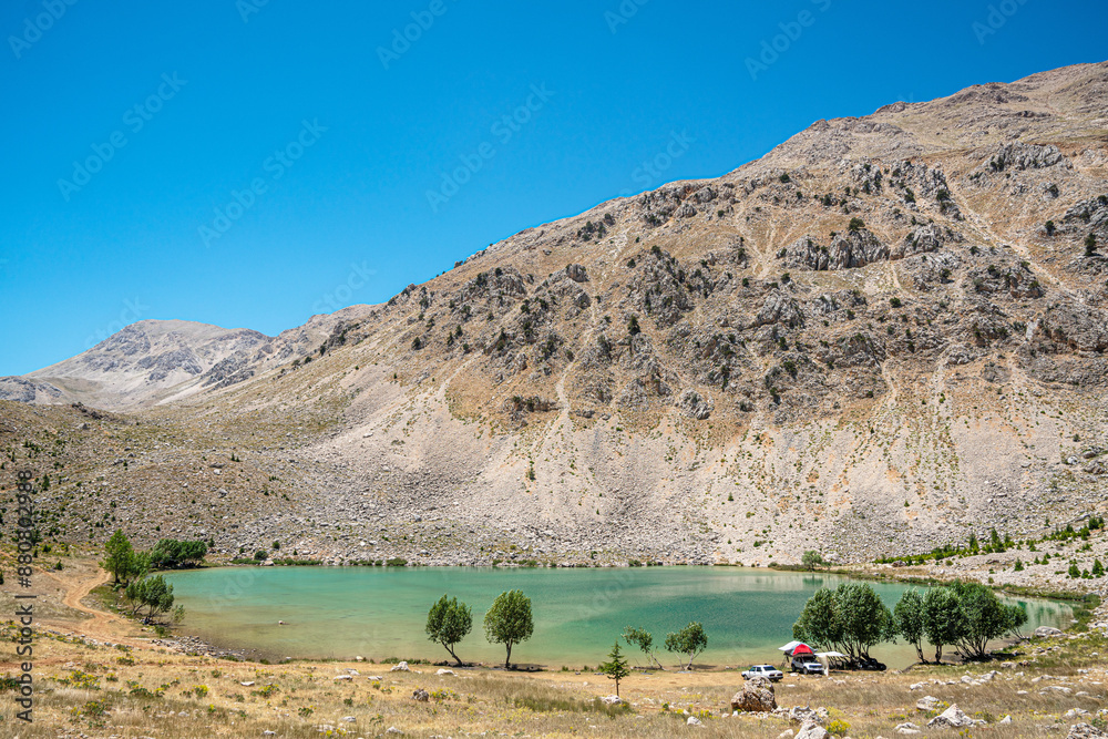 Wall mural The scenic views of Green Lake, a crater lake, is on the Gömbe Plateau, famous for its unique geographical riches. It is on the slope of Akdağ, the second-highest peak of Antalya.