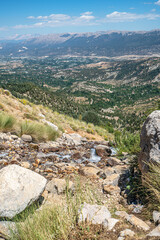 The scenic views of Gömbe Uçarsu Waterfall which  fly like a white cloud down the rocks at an altitude of about 50 meters, with a cave underneath, Gömbe, Kaş, Antalya