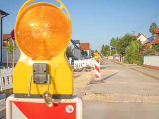 Fence and signs on road repair, Construction site Warning Light

