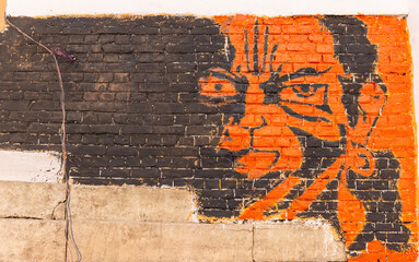 Colourful painting of lord hanuman at temple in varanasi.