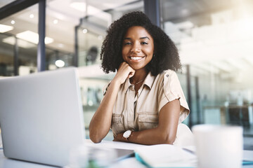 Laptop, office and portrait of happy black woman with notes, research and advisor at desk. Smile, online consultant or business development manager with confidence, pride and notebook for planning