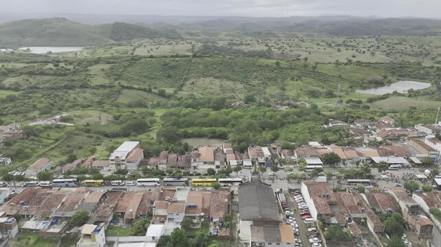 Drone flies to the right over Galante facing north