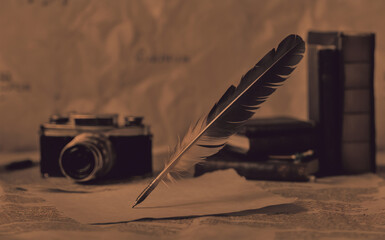 old paper and feather